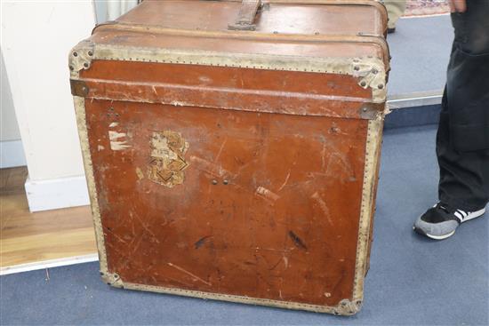 A Victorian leather covered wooden bound trunk W.60cm